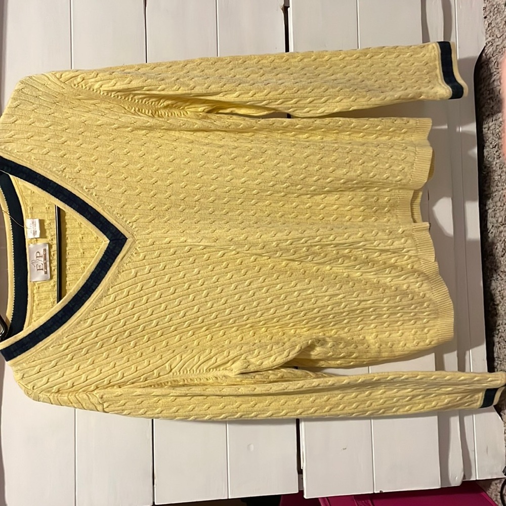 v-neck sweater pastel yellow w/ green trim on the neck and sleeve